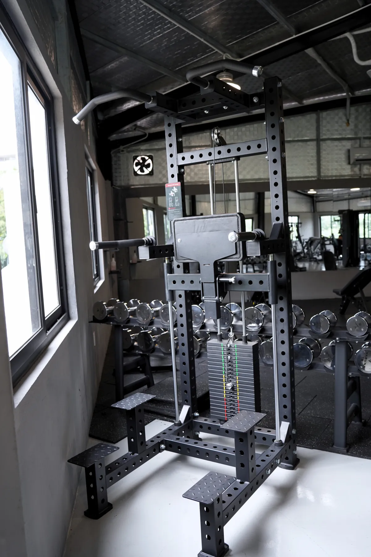 Assisted dip and pull-up machine on the LEGION IX training floor