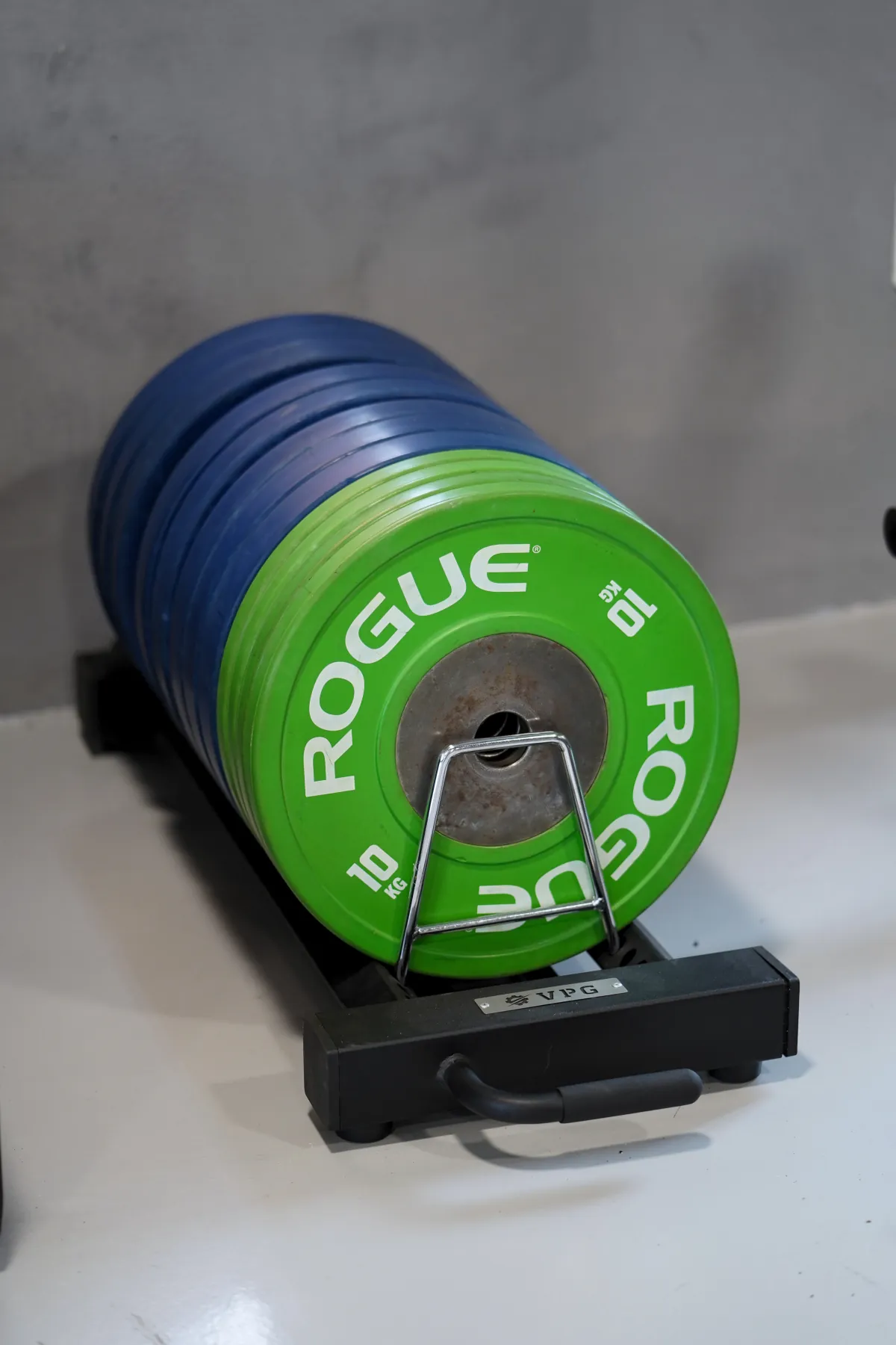 Bumper weight plates on the LEGION IX training floor