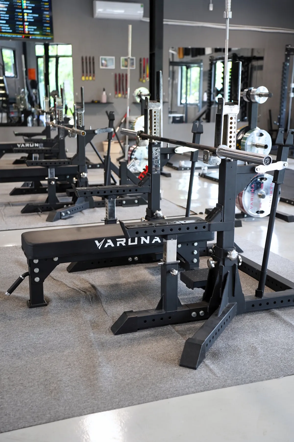 Powerlifting combo rack on the LEGION IX training floor