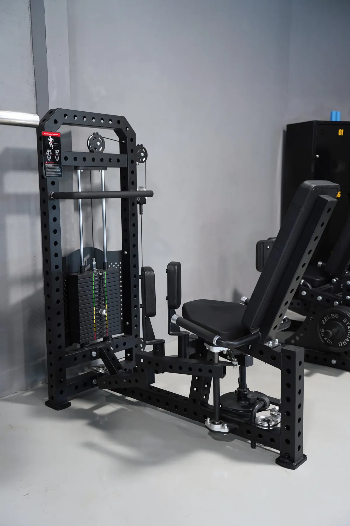 Hip abduction and adduction combo machine on the LEGION IX training floor