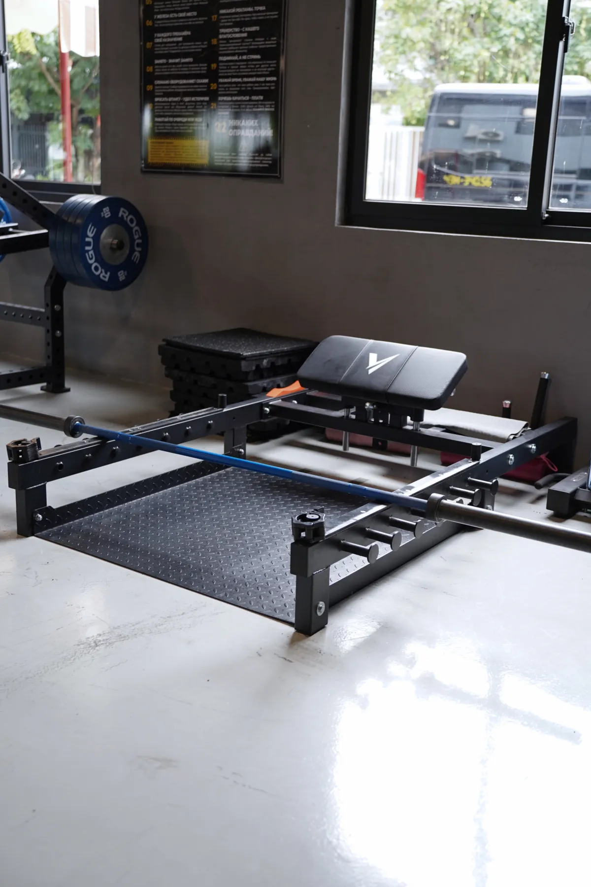 Hip thrust platform on the LEGION IX training floor