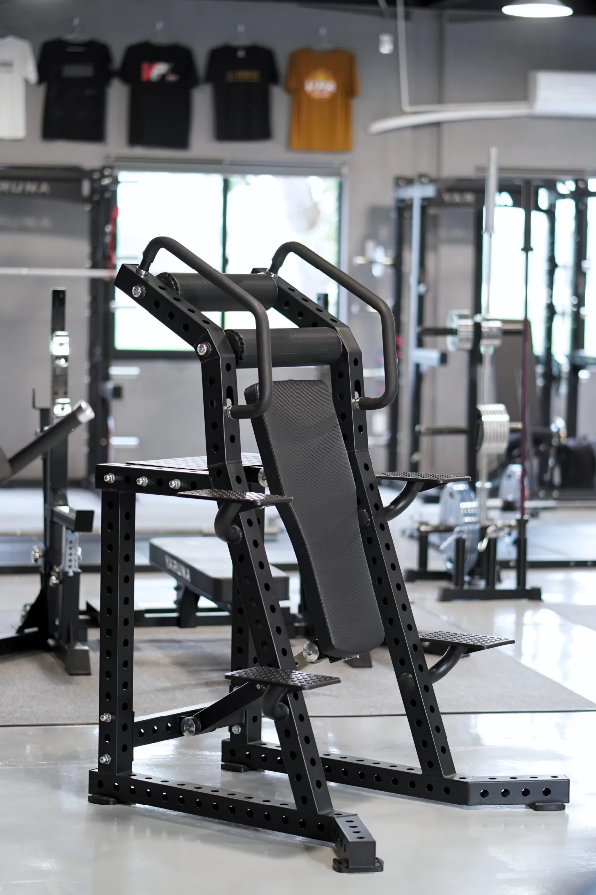 Inverted sit-up bench on the LEGION IX training floor