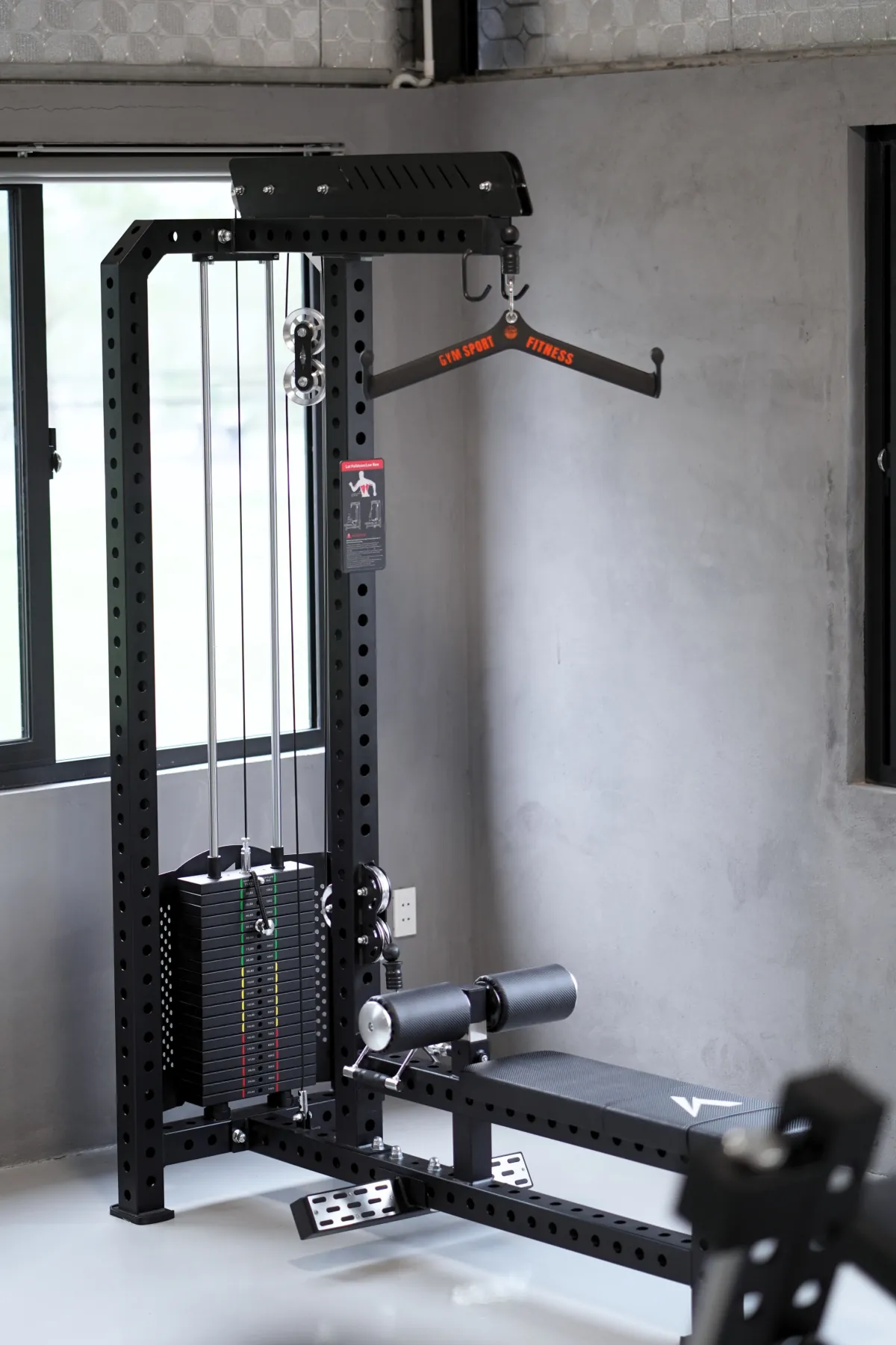 Lat pulldown and seated row combo machine on the LEGION IX training floor