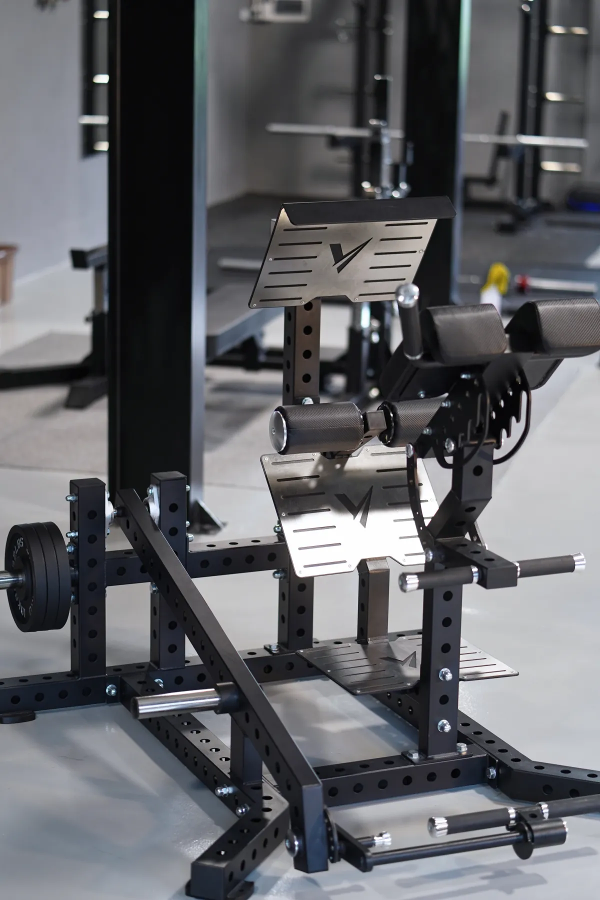 Loaded hip extension machine on the LEGION IX training floor