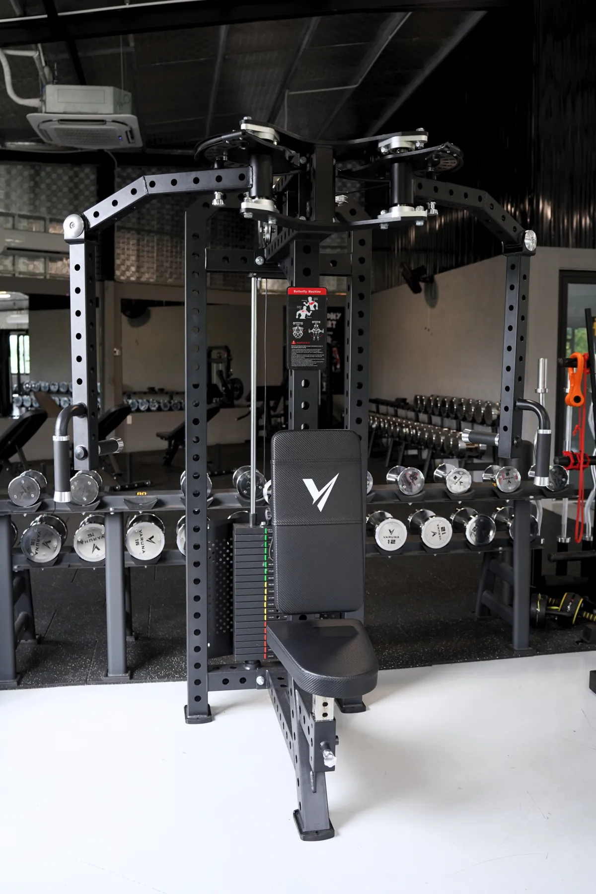 Pec deck and reverse fly combo machine on the LEGION IX training floor