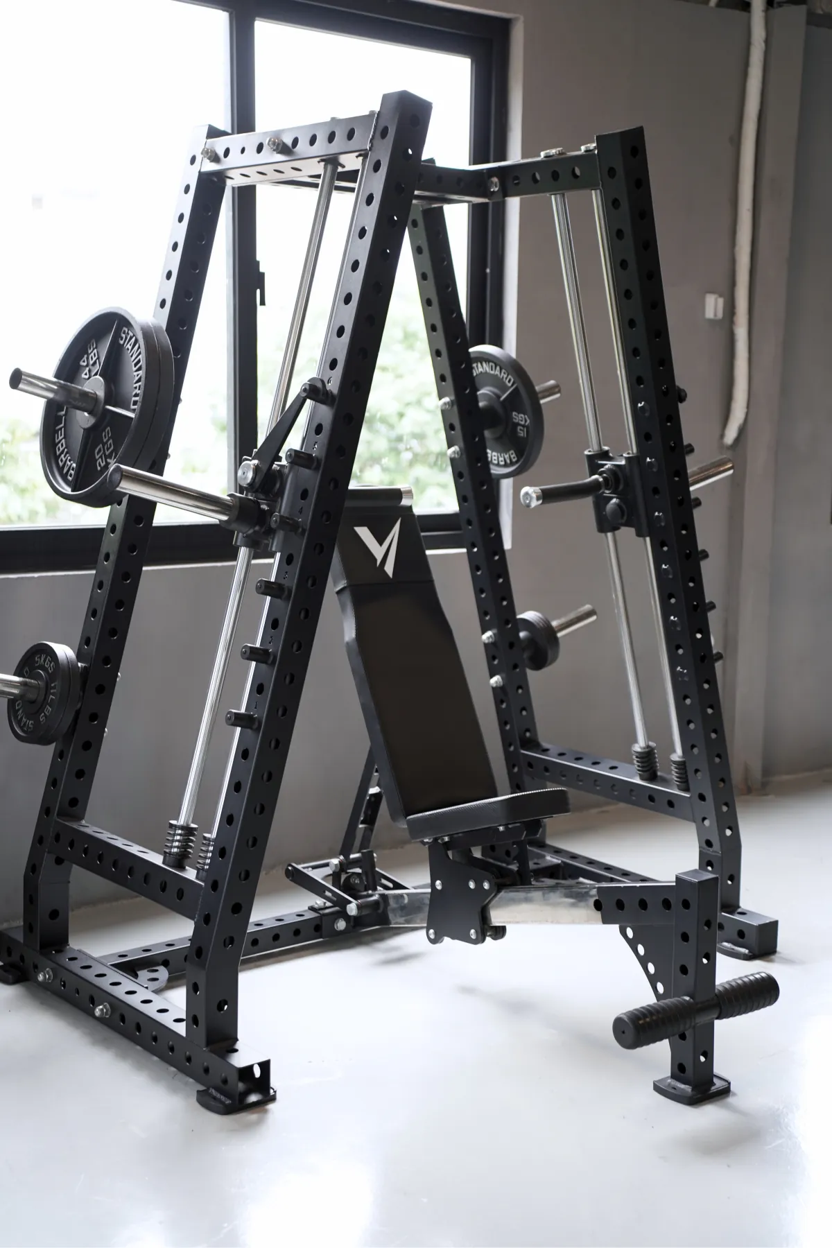 Smith shoulder press machine on the LEGION IX training floor